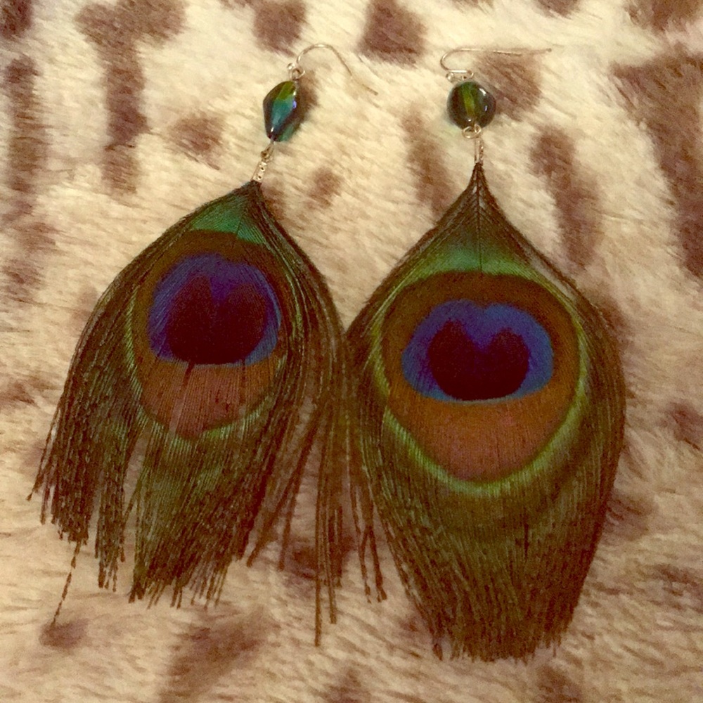 Feather statement earrings!